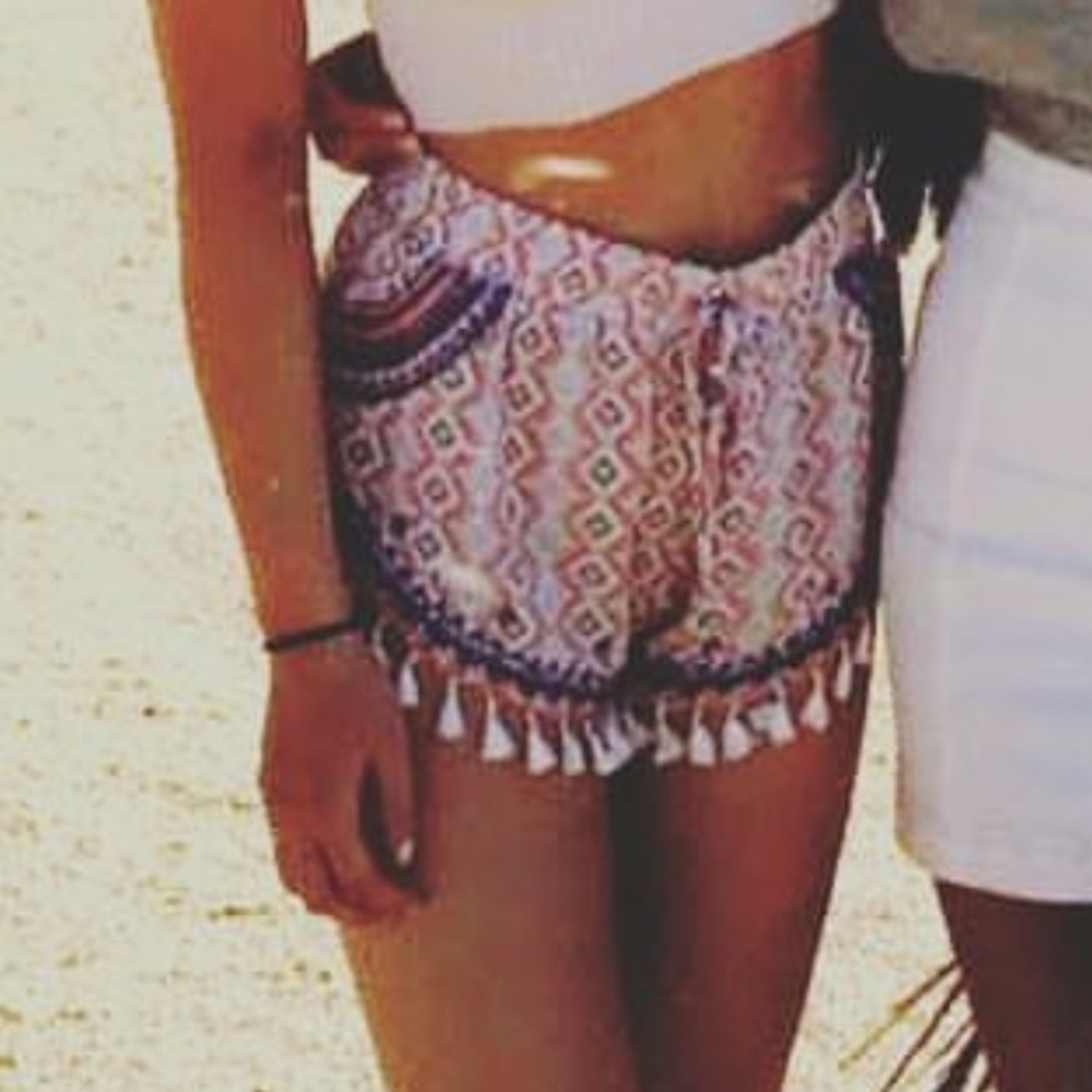 NWOT High waisted shorts with Pom fringe